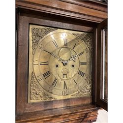 30-hour 18th century oak cased longcase clock by Jeremiah Standring of Bolton, (Lancs) c 1770, with a swan’s neck pediment on a flat top with a blind frieze beneath, square brass dial flanked by reeded pilasters and wooden capitals, long trunk door with a concave wavy top, trunk with reeded quarter columns on a rectangular plinth on a decorative skirting, dial with a formerly silvered chapter ring and engraved dial centre, with Roman numerals, five minute Arabic’s, square date aperture, circular boss engraved with the makers name, cast spandrels and “dummy” winding arbors, dial pinned directly to a rope driven countwheel striking movement, striking the hours on a bell. With weight and pendulum. 
30-hour clocks with “dummy” winding arbors are more commonly found on later 19th century painted dial longcase clocks, this is an earlier example by a recorded Lancashire clock maker born in Rochdale in 1712, dying in Bolton 1782.  

