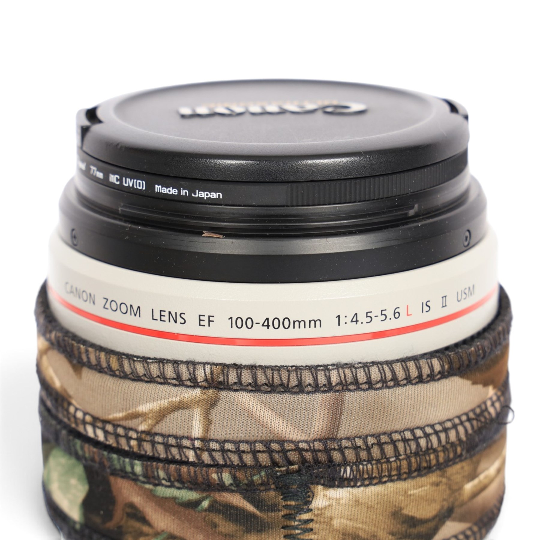Canon EF 100-400mm f/4.5-5.6L Image Stabilising Ultrasonic camera lens serial no. 4710001538, with camouflage cover and lens case, boxed with instructions