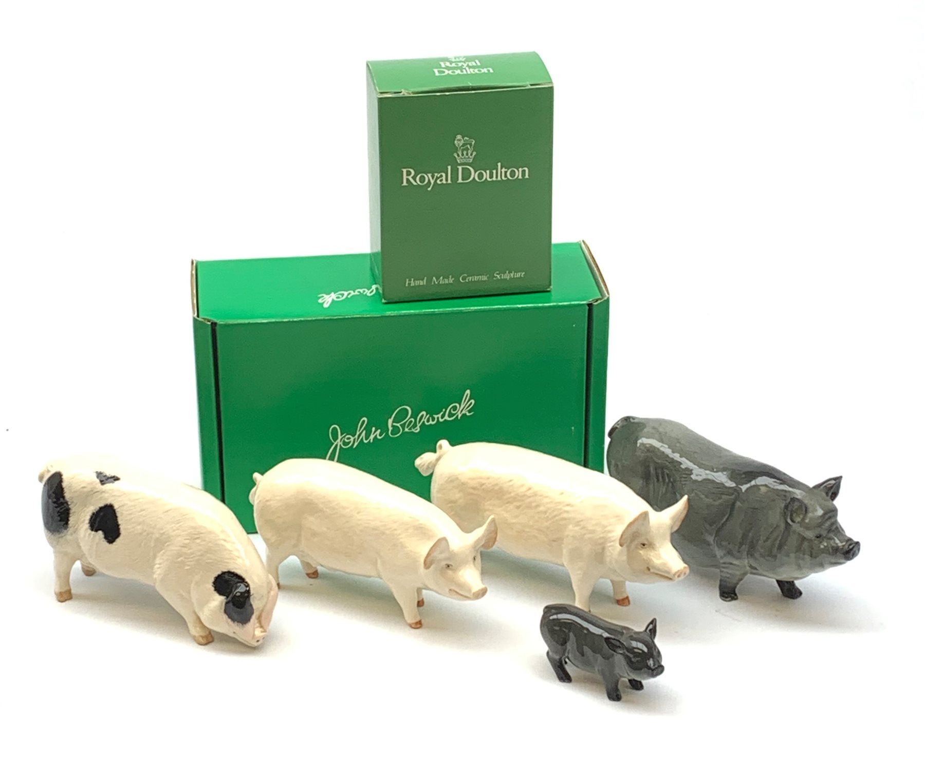 A Beswick CH Wallboy Pig, together with a CH Wallqueen Sow, a Gloucester Old Spot, with maker's box, and a Royal Doulton Pot Bellied Pig, and Piglet, with maker's box, each with printed mark beneath.