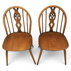 Ercol - Set of four dark elm 'Fleur De Lys' chairs
