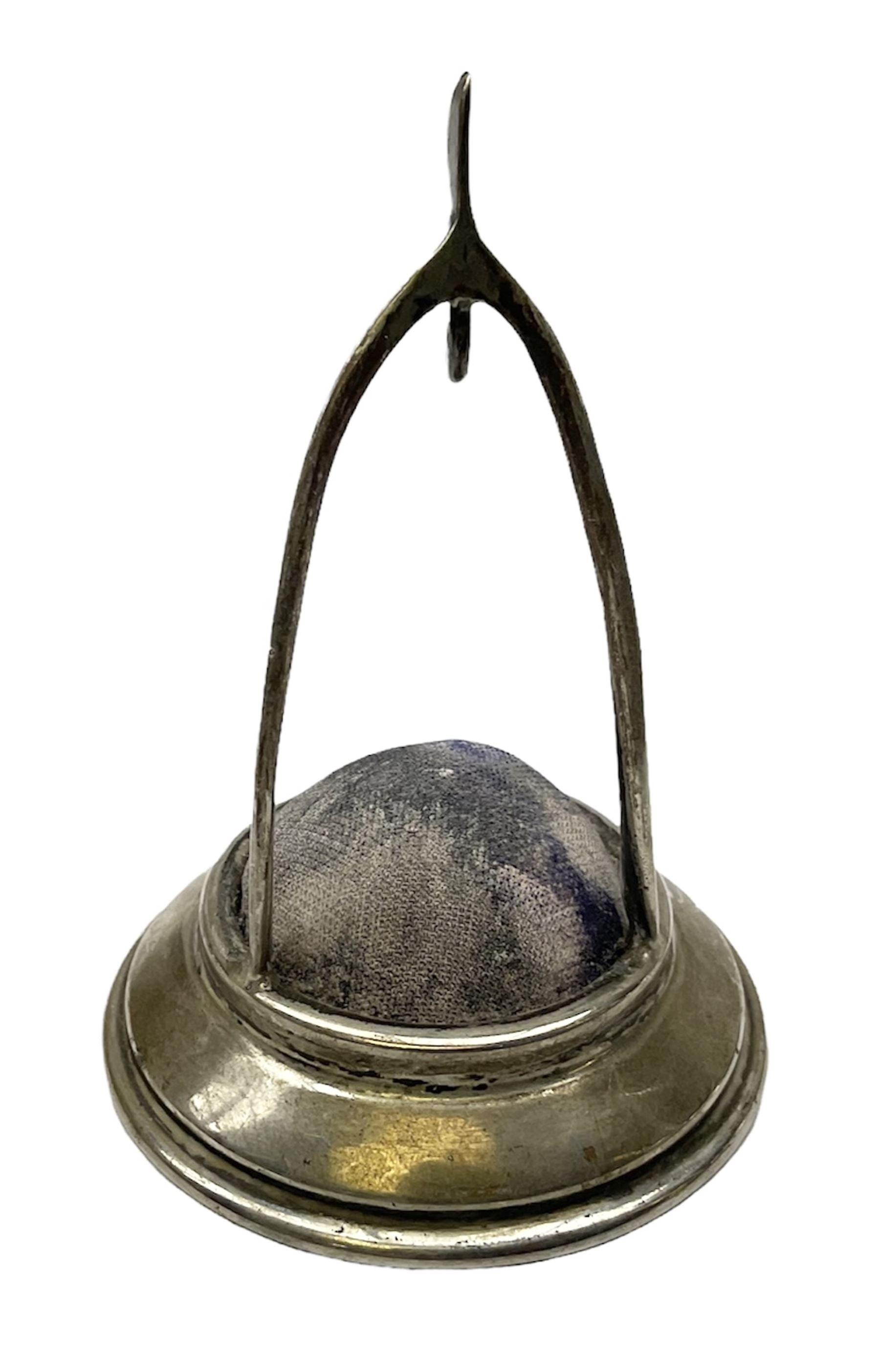 Silver hallmarked novelty pin cushion and pocket watch stand modelled as a wish bone
