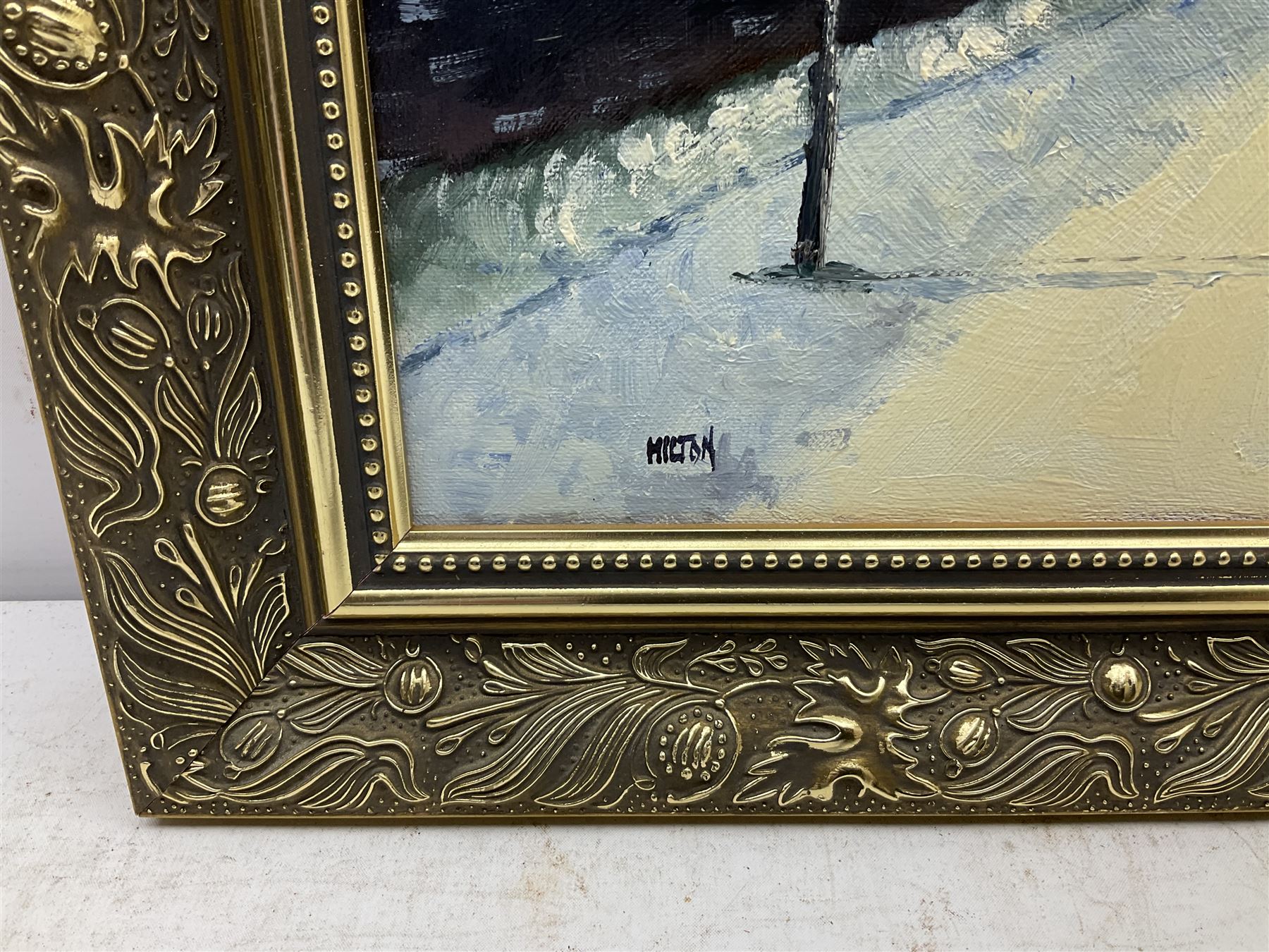 Barry Hilton (British 1941-): Snowy Winter Street Scene, oil on canvas signed 29cm x 39cm