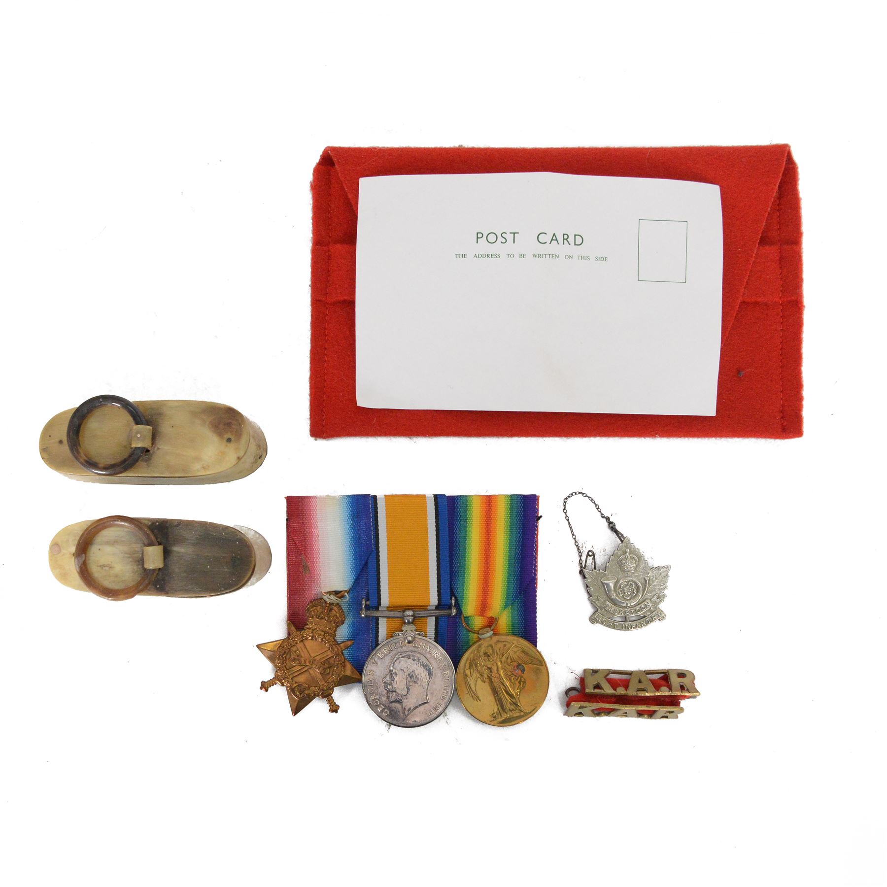 WWI trio medal group, 1914-15 Star, War and Victory medal, awarded to 2631 SJT T.M. Cave. 3- Lond. R, together with two horn snuff boxes
by vendors repute the two snuff boxes were presented to T.M. Cave by his men in the Kings African Rifles at the end of WWI