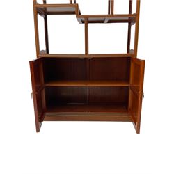 Hong Kong hardwood curio stand, six varied tiers, two base cupboards