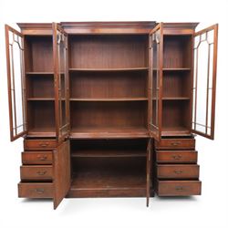 Wade Furniture - Georgian design mahogany breakfront bookcase cabinet, featuring four astragal glazed doors, above eight drawers and two cupboards, one fitted cutlery drawer