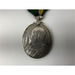 Edward VII Territorial Force Efficiency medal awarded to 471 Gnr. F.J. Burden  2/NTH'BN B.R.F.A. with ribbon and ribbon bar; and George V 1911 sixpence