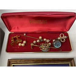 Quantity of coins, to include five pound coin and cased sets, mahogany box with dark blue velvet compartmented interior, hat pin, silver plated napkin rings, etc