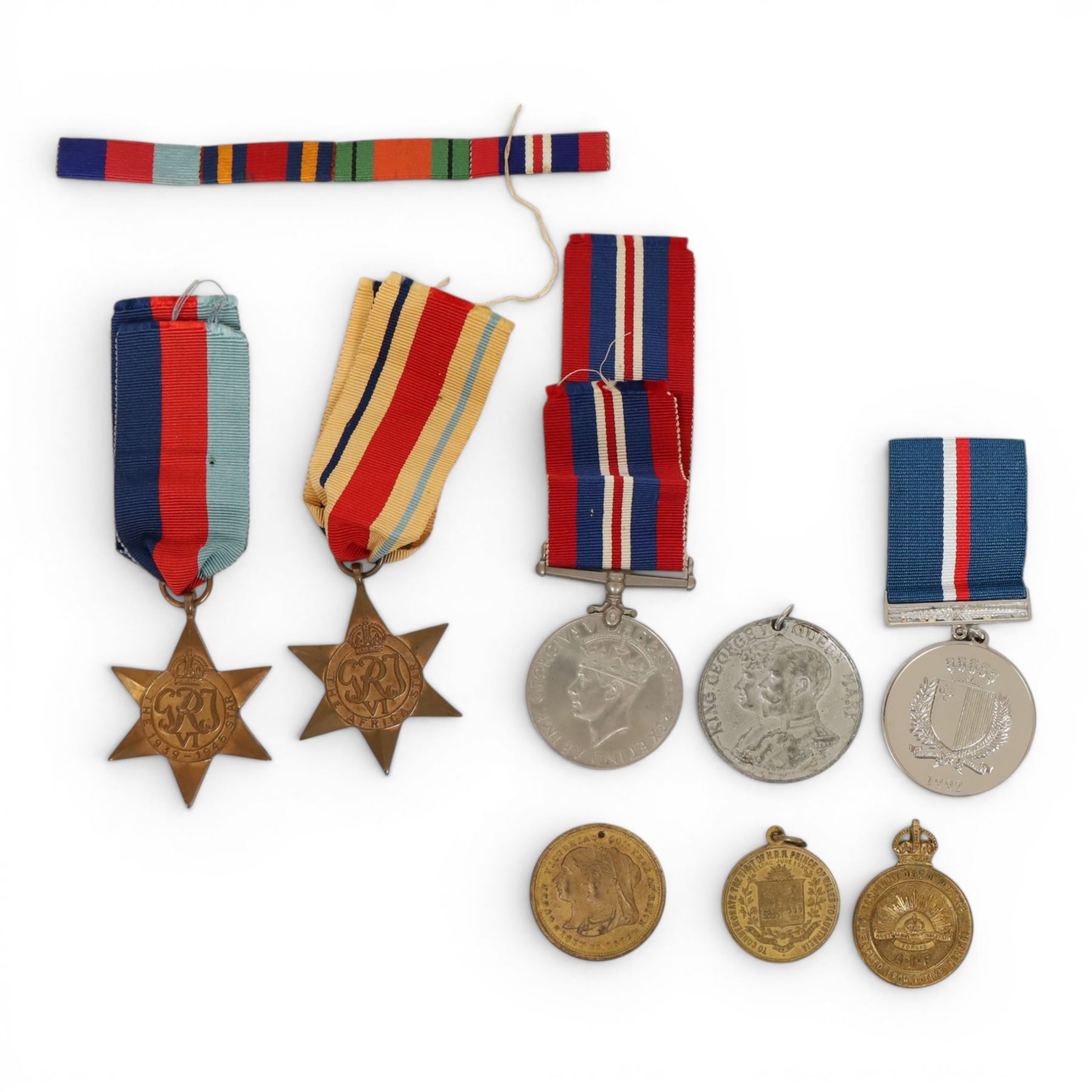 WWII trio comprising War medal, African star and 1939-1945 star, together with Gibraltar medal and others 