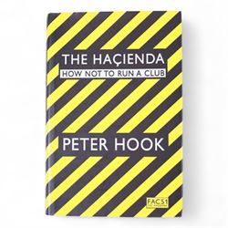 Joy Division/New Order framed album inserts and CDs, both signed by Peter Hook, together with three signed Peter Hook books 'Unknown Pleasures', 'Substance' and 'The Hacienda' and two The Hacienda t-shirts, frame H33cm