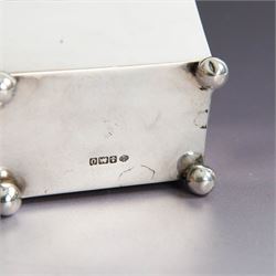 Early 20th century silver tea caddy, of sarcophagus form with twin lion mask mounted loop handles, upon four bun feet, hallmarked William Hutton & Sons Ltd, Birmingham 1913, H8cm, W9cm