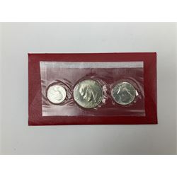 Four 'United States Bicentennial Silver Uncirculated Set 1776-1976', each consisting of quarter dollar, half dollar and one dollar coin, in blister packs and red envelope