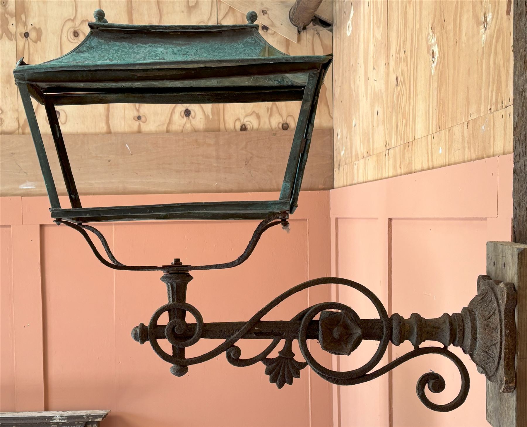 Pair of substantial cast iron gas lamp brackets of scrolling form, fitted for gas, complete with original oblong pagoda topped copper lanterns. L104cm, H80cm. - COLLECTION BY APPOINTMENT FROM: The White House, Thirsk Road, Easingwold, York, YO61 3NF - CALL 01723 507111 TO ARRANGE