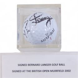 Four signed balls, including golf ball, signed at 2002 British open by Bernard Langer, Uni-Ball Basket Ball, signed by Edinburgh Rocks team 1998/99, football signed by Heart of Midlothian team, signed baseball and an unsigned Gunn & Moore cricket ball