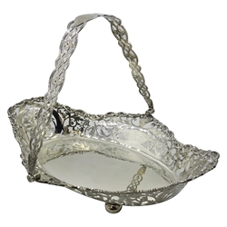  Edwardian silver swing handle basket, pierced decoration by Goldsmiths & Silversmiths Co Ltd, London 1903, L28.5cm, approx 14.5oz. Provenance Property of Bob Heath, Brandesburton Formerly of Ravenfield Hall Farm near Rotherham  