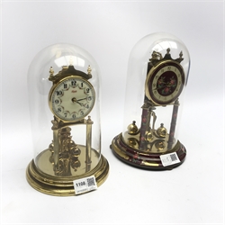 Late 20th century Kundo anniversary clock with enamel Arabic dial decorated with floral garlands and a late 20th century Koma anniversary clock, both under glass domes
