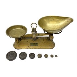 Pair of brass weighing scales by J. Johnson & Sob of Hull, together with quantity of weights