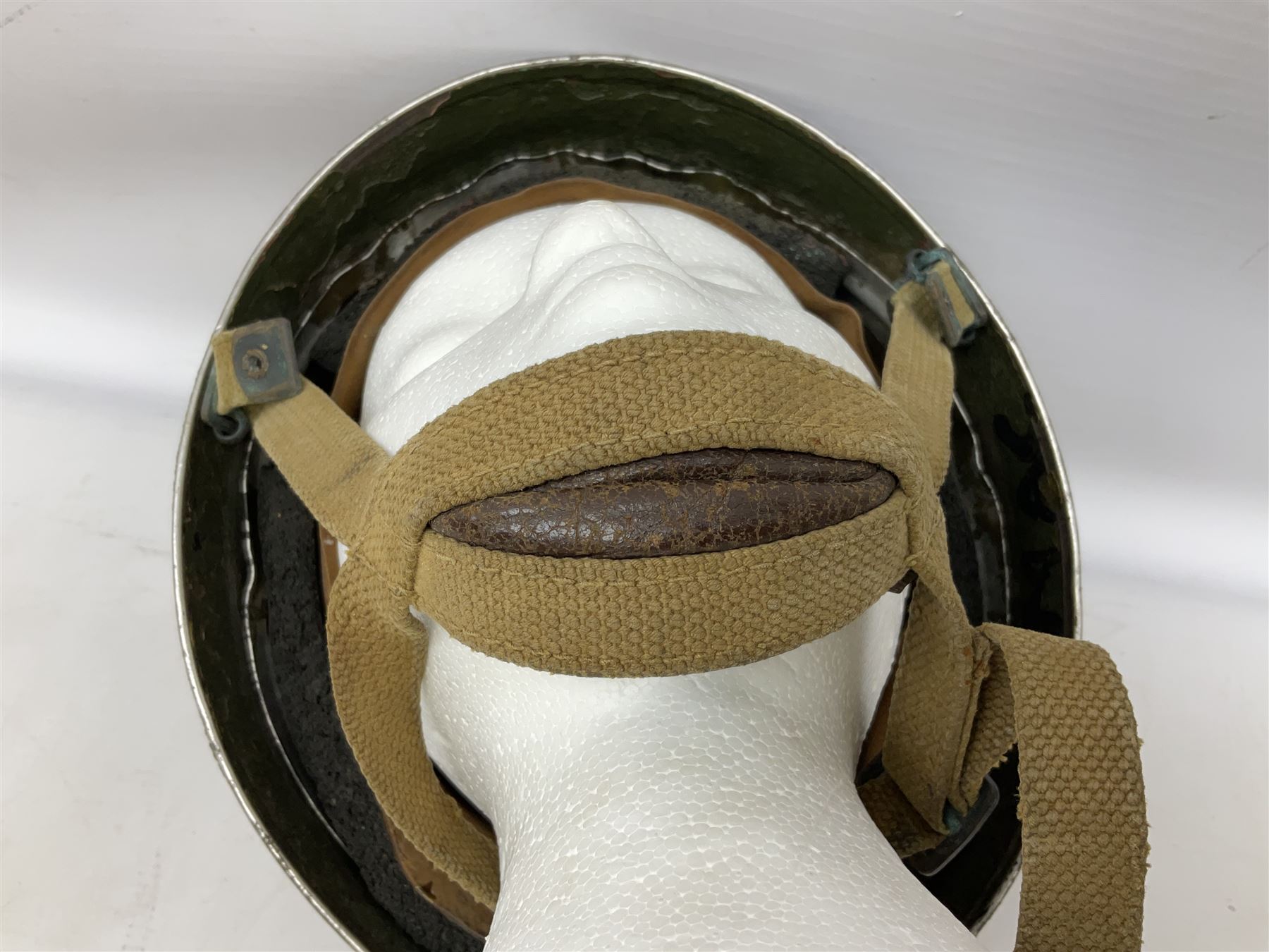 Post-WW2 British Airborne Troops,/Paratroopers Steel Helmet with green textured paint finish, leather and sponge liner and three point chinstrap mounting; liner marked BMB II 1953 71/4