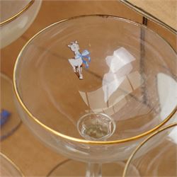 Set of fourteen Babycham glasses