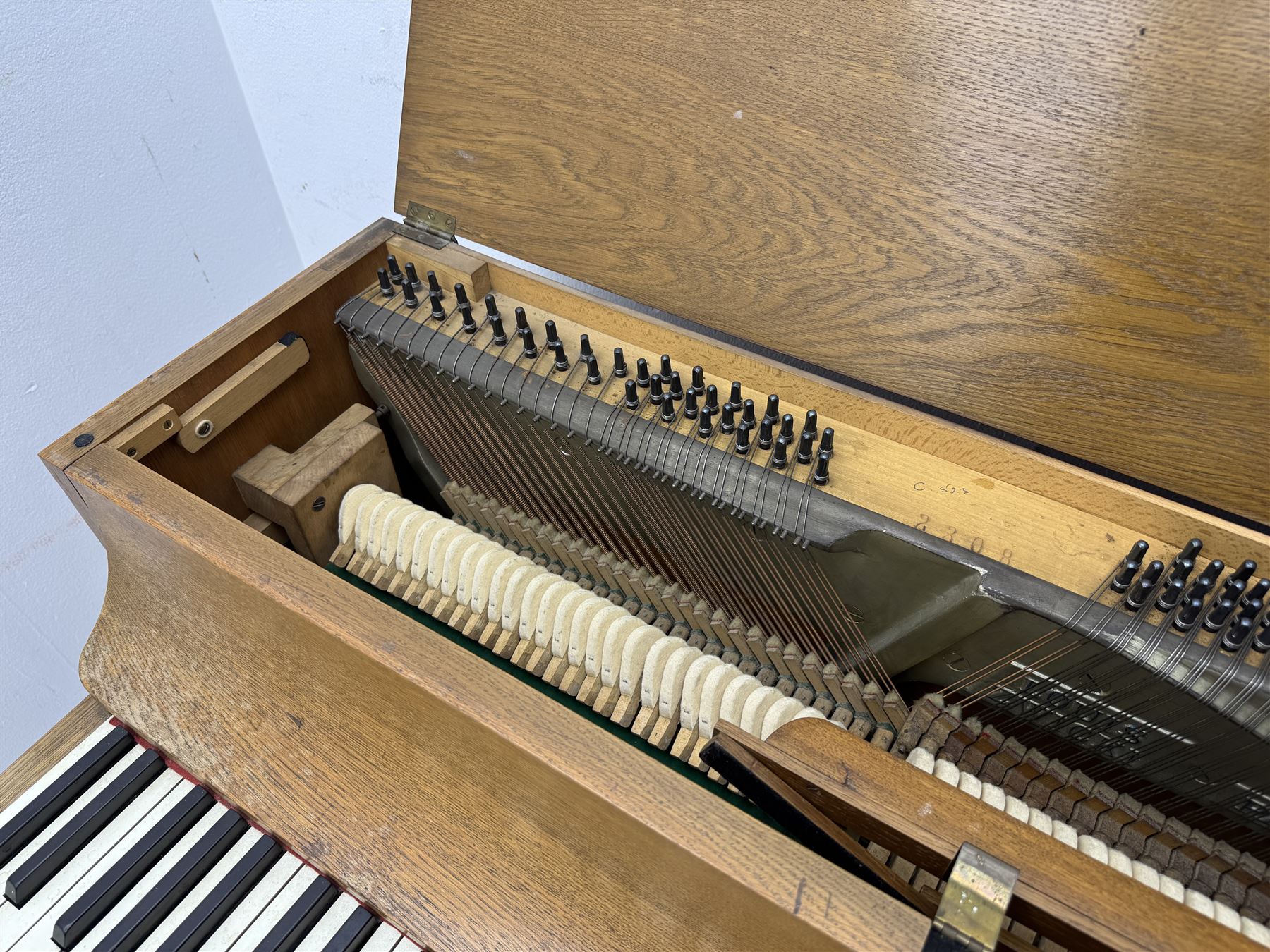 Louis Zwicki - mid-20th century oak cased compact piano, fitted with a folding music rest and full keyboard, dual brass pedals