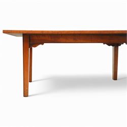 Mid 20th century french hardwood coffee table, rectangular top with gently chamfered edge, raised on square tapering supports united by simple corner brackets