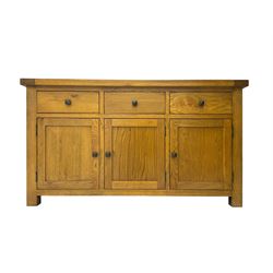 Oak Furnitureland, golden oak sideboard. Three single draws, three cupboard doors with single shelf