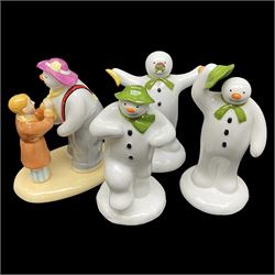 Four Coalport Characters The Snowman figures, comprising The Finishing Touch with certificate, The Greeting, Magical Moment and The Wrong Nose, all with original boxes 