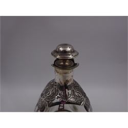 20th century Mexican silver overlaid Dimple whisky decanter/jug with stopper, the glass body overlaid with pierced floral silver decoration, with silver C handle and silver stopper, stamped 925 to base, H23.5cm