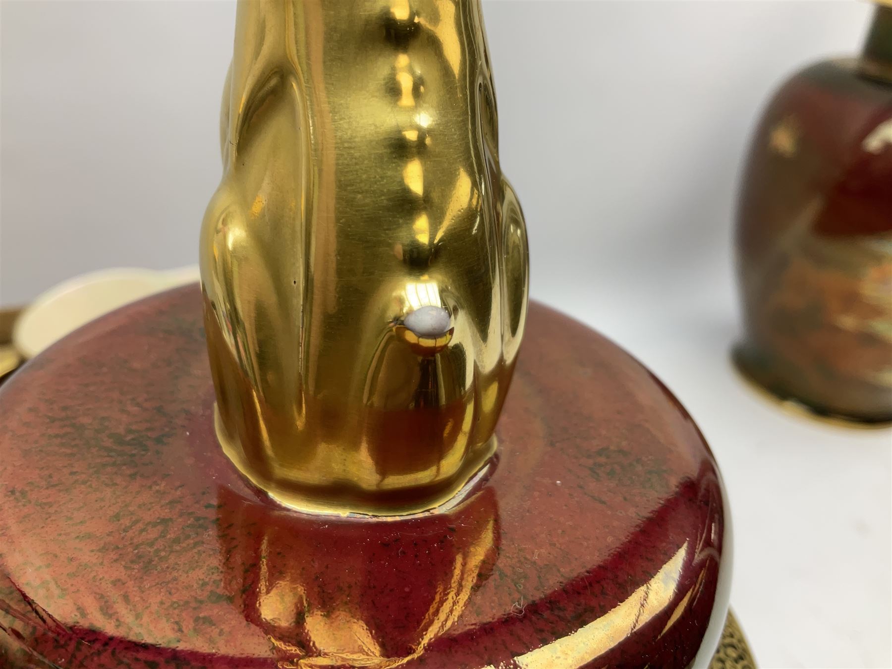 Two Crown Devon Rouge Royale pattern large temple jars with temple dog finial to lid, together with seven other Crown Devon ceramics and two lidded Carlton Ware temple jars in Red Royale, tallest example H47cm (11)