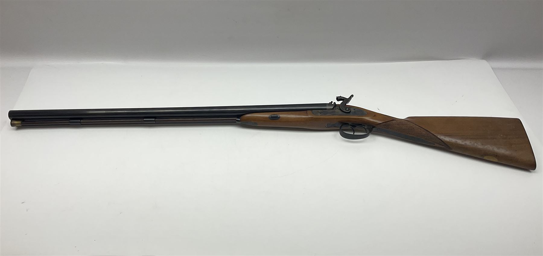 SHOTGUN CERTIFICATE REQUIRED: Fabbrica Armi F.lli Pietta Gussago BS Italy 12-bore side-by-side muzzle loading black powder double barrel percussion hammer gun, retailed by Navy Arms Co. Ridgefield N.J., the 71cm (28