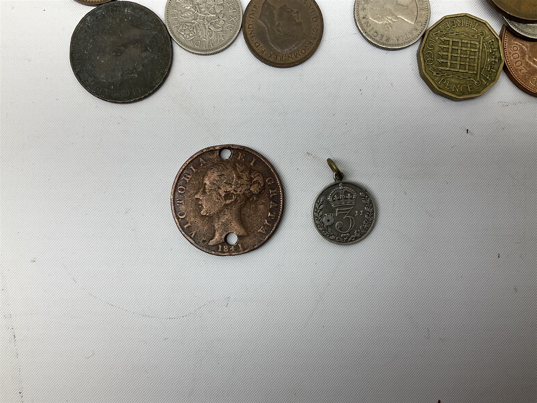 Queen Victoria 1875 and 1880 half crown coin, small number of pre 1947 Great British silver coins, three Queen Elizabeth II five pound coins, five two pounds, pre-decimal coins including pennies, brass threepence pieces etc