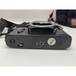 Four camera bodies, to include, Ricoh KR-10 serial no. 38826, Pentax MZ-M serial no. 4185969 with 'SMC Pentax- M 1:3.5 28mm' lens, Canon EOS500 serial no. 080927, with 'Sigma Zoom 100-300mm 1:4.5-6.7 DL'  lens etc, with other camera lenses and equipment 