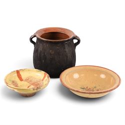 Spanish twin handled cooking pot, blackened to the outside, together with two bowls with s...