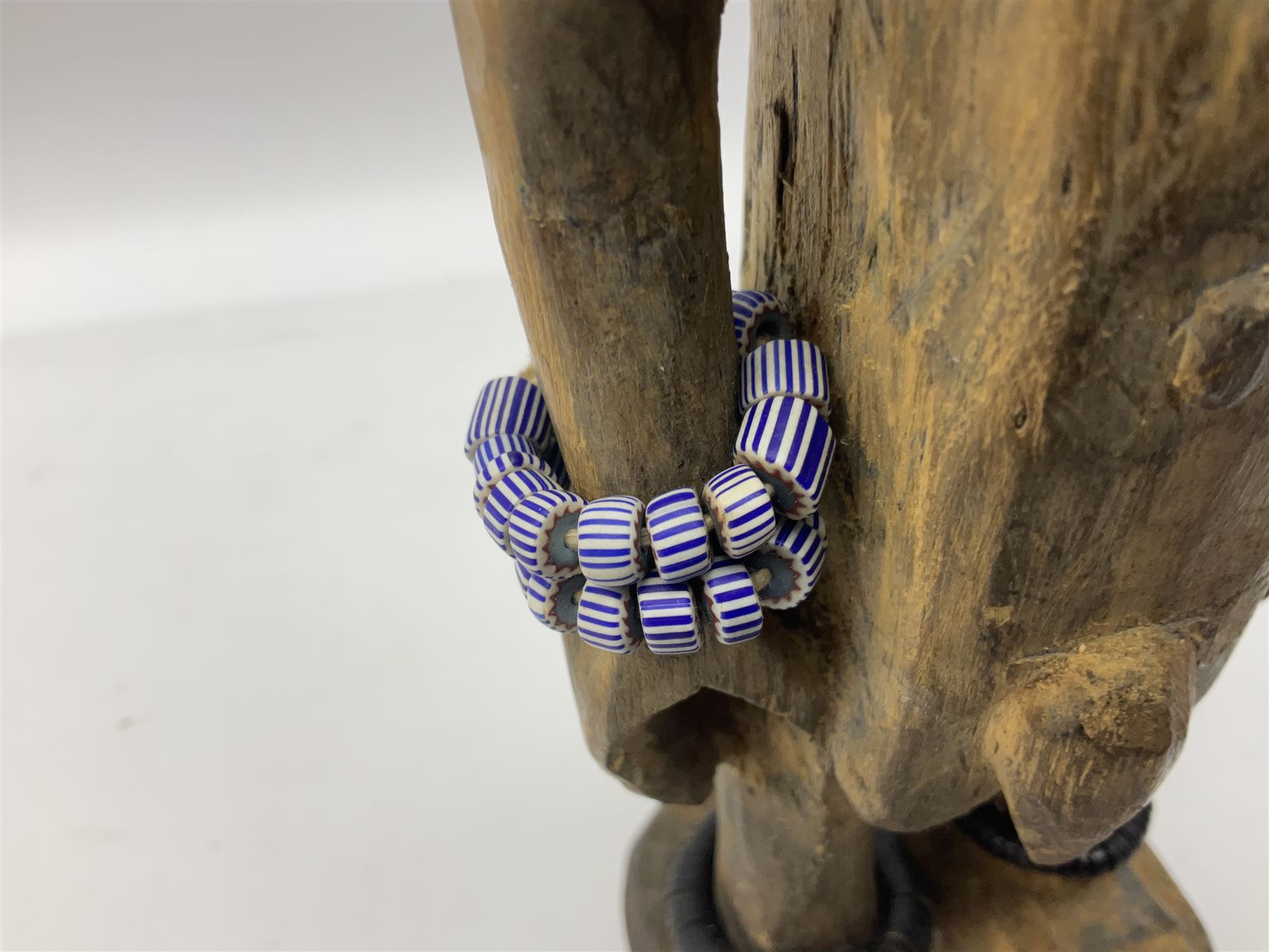 Early 20th century West African Yoruba family wooden figure of Orisha Oko, the god of farming/agriculture, carved from the solid, bears manuscript label of provenance verso H26.5cm