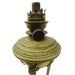  19th century French Neoclassical style brass oil lamp, decorated with three figural winged masks, the reservoir applied with acanthus leaf and pinecone terminal, on three lion paw feet, H33cm   