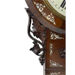 Joseph Critchley of Liverpool -  early 19th century twin fusee 8-day rosewood and mother of pearl inlaid drop-dial wall clock c1820, inlaid circular wooden dial surround with carved ears representing grapes and vine leaves, glazed box with a scroll carved surround, curved base and pendulum adjustment door, 14” painted dial with Roman numerals, minute track, and pierced steel hands within a cast brass bezel and flat glass, dial pinned to a four pillar chain driven fusee movement striking the hours on a bell. With pendulum and key.