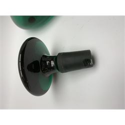 19th century green glass ships decanter with flat topped stopper, H21.5cm, together with a set of four 19th century green glass wine glasses, the funnel bowls upon bladed knopped stems and circular feet, H13cm