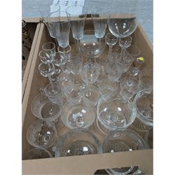 Collection of assorted glassware, to include Czech hand painted lemonade set, with tall jug and six glasses, pair of Art Nouveau blue glass vases painted in gilt with foliate tendrils, John Walsh style bowl with cut leaves decoration, various Edwardian drinking glasses with cut and etched decoration, etc., in two boxes