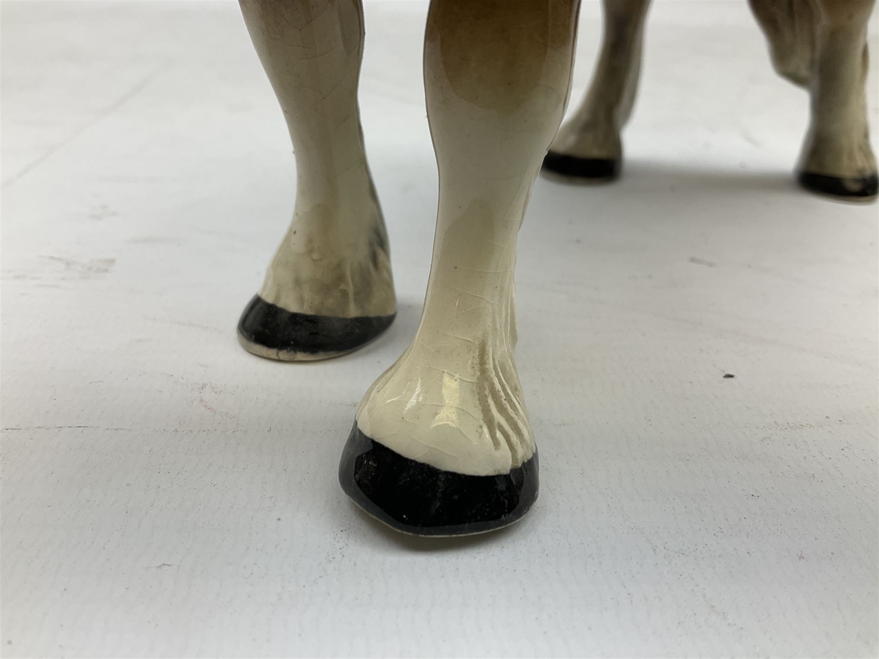 Seven Beswick figures of horses, including Connemara pony in grey no.1641, Arab in bay no.1265, large foal in grey no.947 etc, together with a Goebel figure of a horse (8)