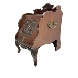 Late 19th century walnut coal box, the shaped pediment carved with c-scrolls and shell, sloped hinged front enclosing metal inset, on foliage carved cabriole feet, with metal carrying handles and coal shovel 