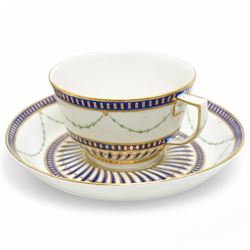 Two sets of Derby tea wares, comprising two saucers, teacup and small bowl, decorated in blue and white, with teardrop and swag motifs, heightened with gilt, one set marked pattern no. 34,  with late 18th century D mark in puce, the other with crown, D mark and crossed batons in puce (4)