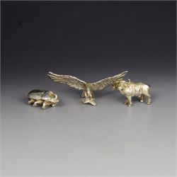 Three miniature silver filled studies of animals, comprising water buffalo, eagle in fligh...