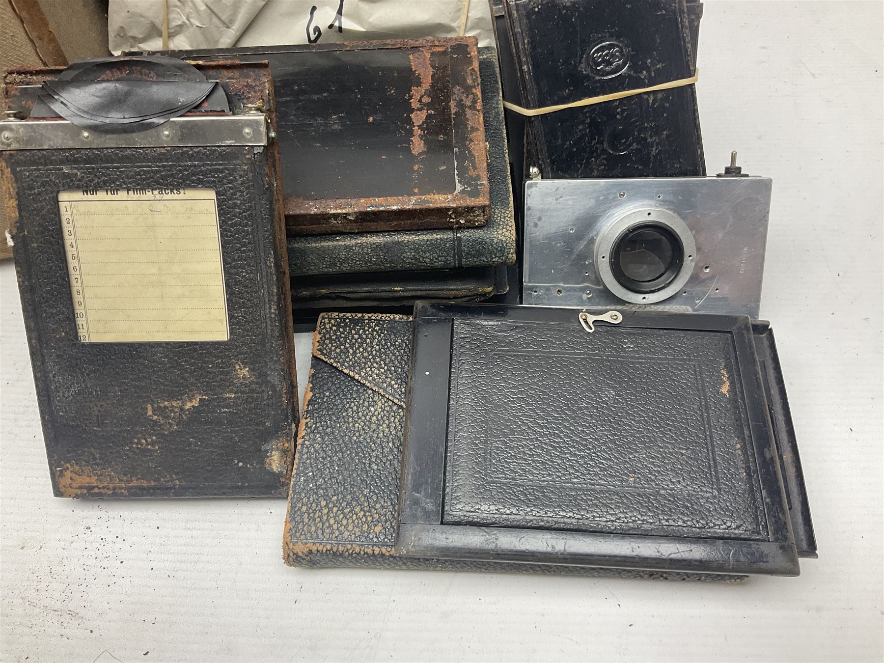 Contessa-Camera Werke folding camera, together with Hirrlinger folding camera, additional plates, two tripods and other accessories 