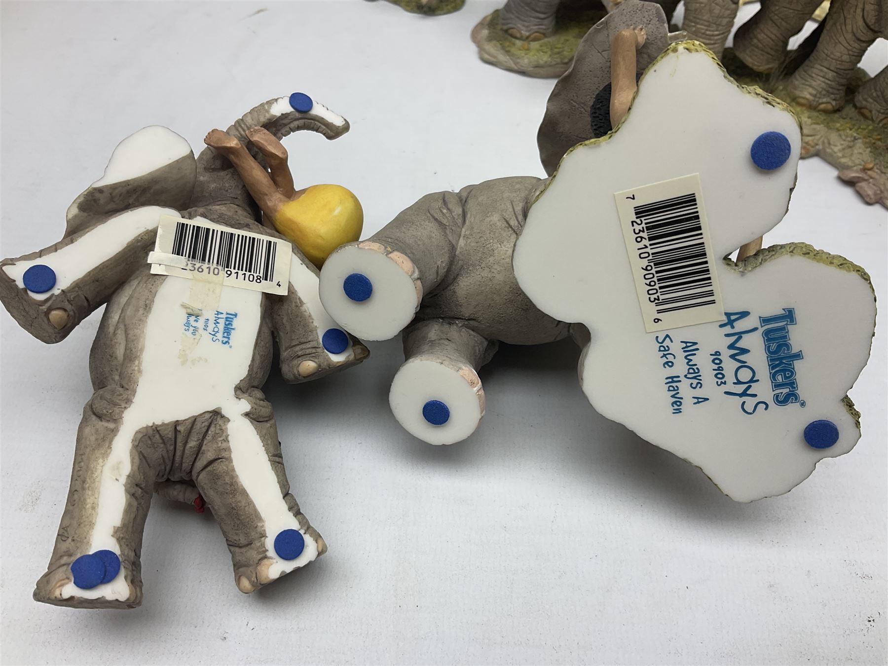 Seven Tuskers elephant figure groups, to include limited edition Stop! Mice Crossing 3479/4000 and Hide n' Squeak 77/4000, Love is... Sharing, Always a Safe Haven, Together Always etc, tallest H24cm