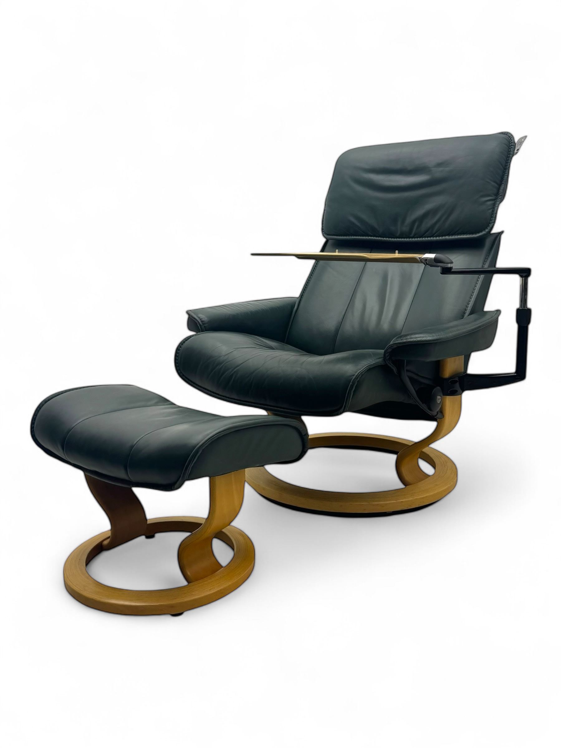 Ekornes Stressless - swivel and reclining armchair with bookrest and matching stool 