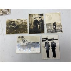 Disbound WW2 album relating to the battleship HMS King George VI containing over fifty various size loose photographs of the ship in action, guns firing, crew members, aircraft, two of George VI on board, three of Winston Churchill on board, official 1942 Christmas messages including Franklin Roosevelt etc; together with unrelated printed letter on 10 Downing Street notepaper from Winston Churchill; and Order of Service for Churchill's funeral at St. Paul's Cathedral 30th January 1965