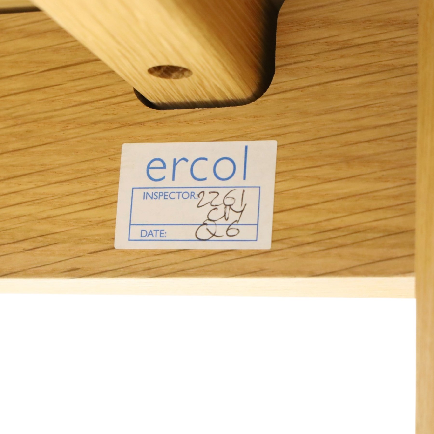 Ercol - 'Artisan' light oak extending dining table, rectangular top with canted corners, with stowable leaf extending the table to 193cm, shaped faceted supports