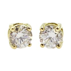 Pair of 18ct gold diamond stud earrings, stamped 750, total diamond weight 0.85 carat, with WGI certificate