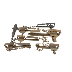 Seven gin traps including H. Lane Victor, 'Lion', Dorset rabbit trap, Sidebotham Gamekeeper's fox trap, A. Macrae 90 etc. Auctioneer's Note: These traps are sold as artefacts for ornamental purposes only as the use of some of them is illegal.