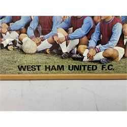 1970-1 photograph of West Ham United FC squad members, including Bobby Moore, Geoff Hurst, Harry Redknapp, Trevor Brooking, Jimmy Greaves, Billy Bonds etc, most players with signatures, 30 x 45cm, framed and glazed