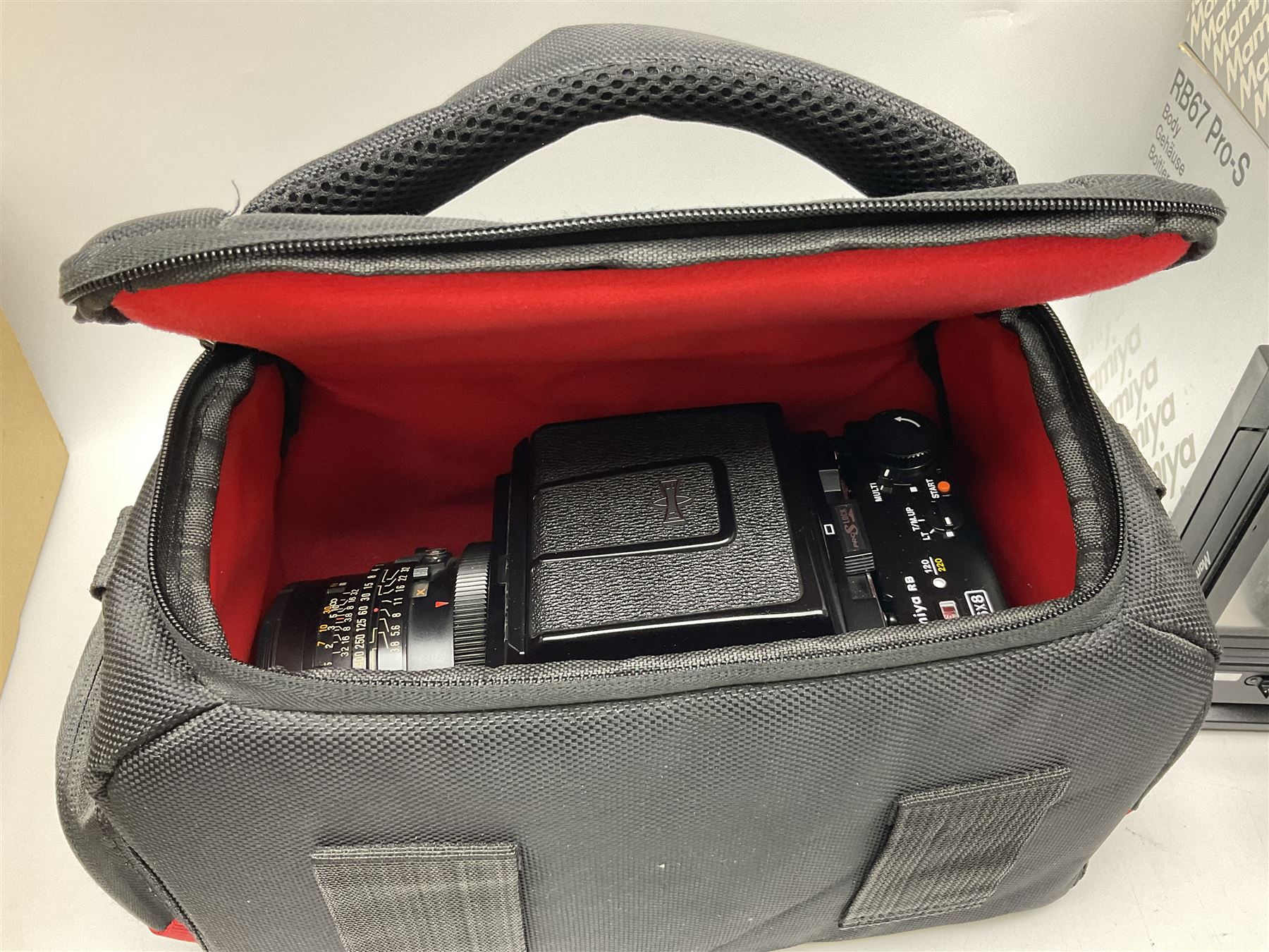 Mamiya RB67 Pro-S camera body, serial no. C559634, with 'Mamiya - Sekor C 1:3.8 f=90mm' lens, serial no. 75999, Mamiya RB 6x8 Pro-S 120 Roll Film Holder and Mamiya Polaroid back holder, with carry case and original boxes 